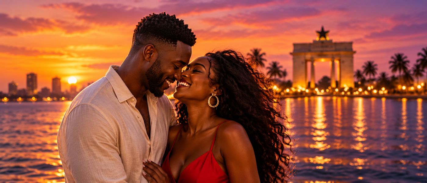 A smiling couple by the water at sunset in Accra